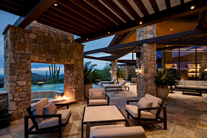 Stone veneer oasis blends indoor-outdoor living