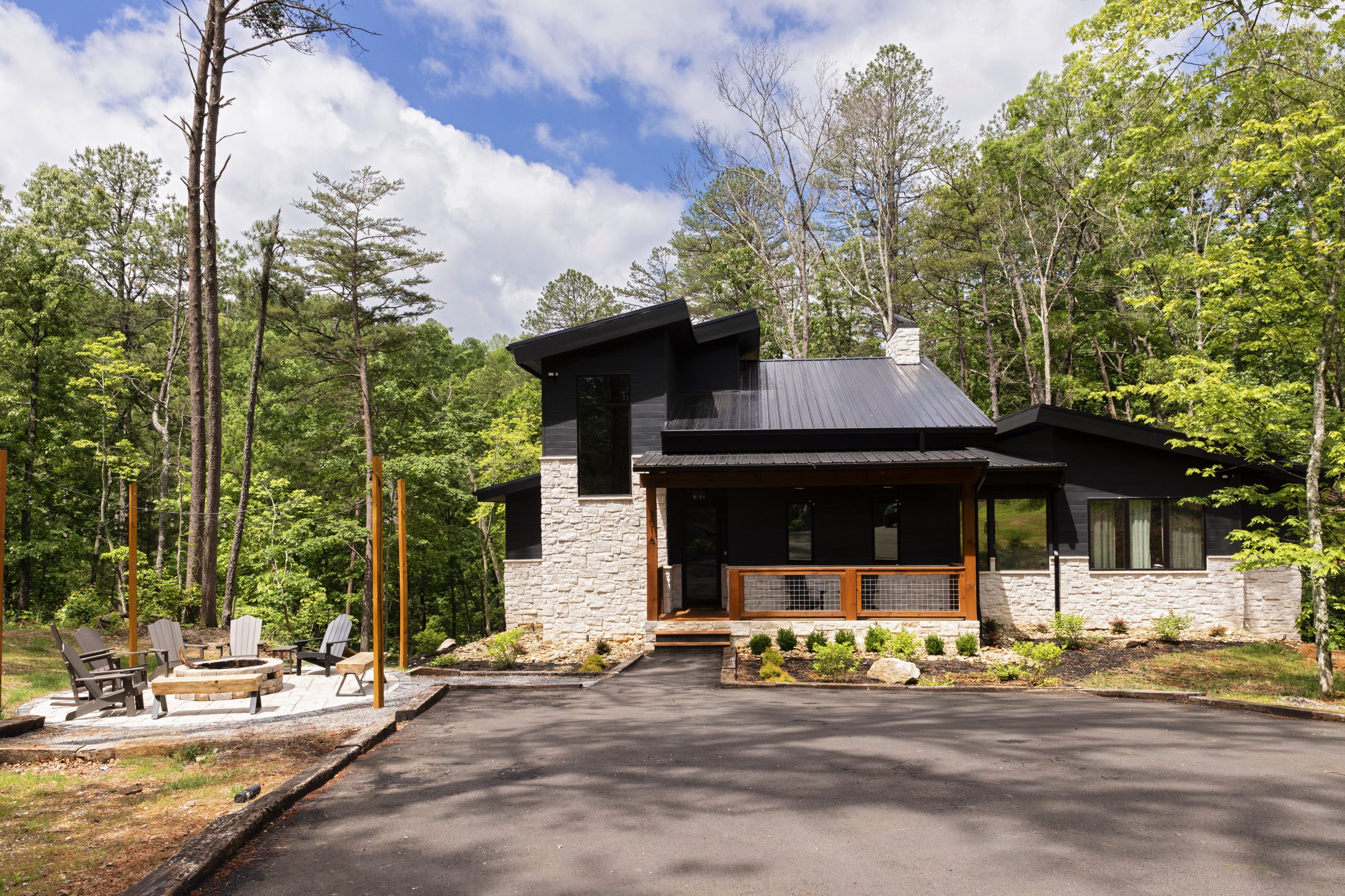 Exterior Home with outdoor fireplace to the left